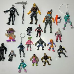 Fortnite Action Figures. Played with condition. Comes with what you see.